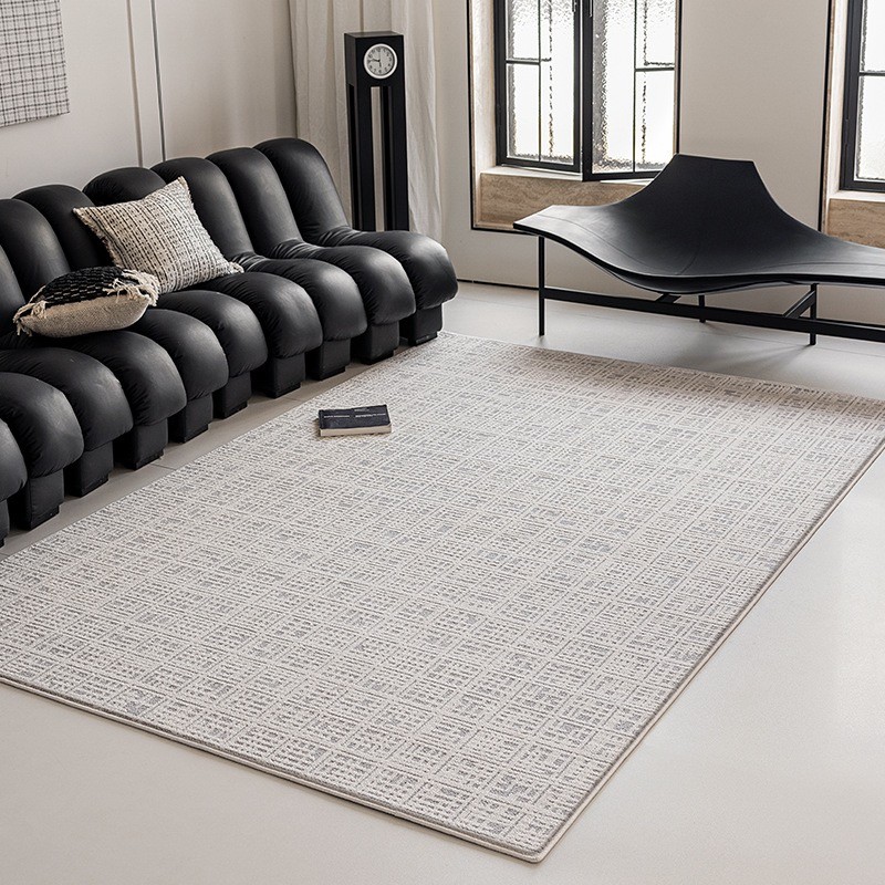 Thảm trải s&agrave;n ph&ograve;ng kh&aacute;ch đẹp cho sofa m&agrave;u đen 